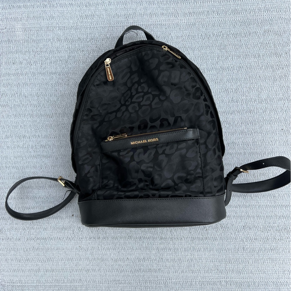 Michael Kors backpack purse.